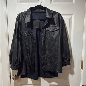 Black Leather Jacket with Button-Up Style and Long Sleeves